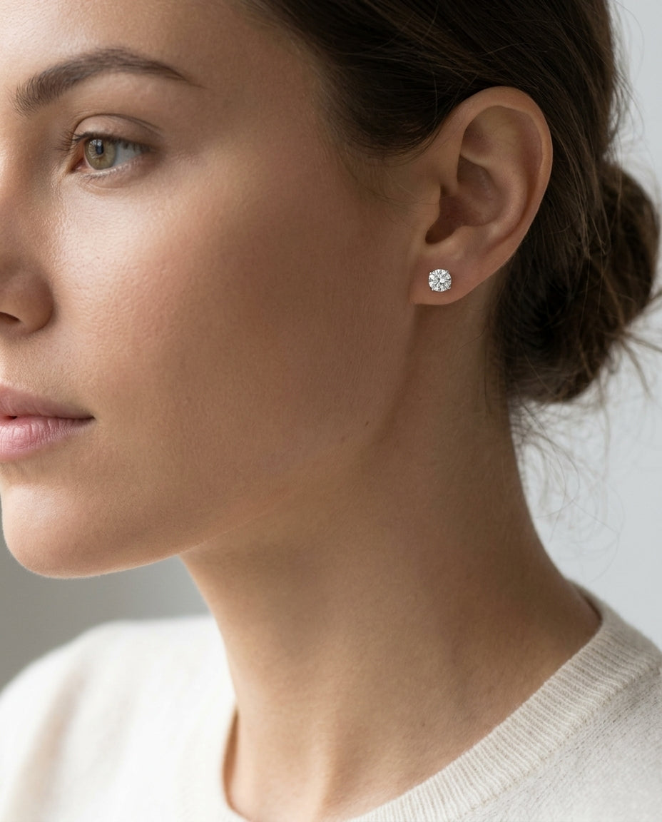 14k White Gold 4-prong Round Brilliant Diamond Stud Earrings (0.75 Ct. T.w., Vs1-vs2 Clarity, F-g Color) — editorial close-up