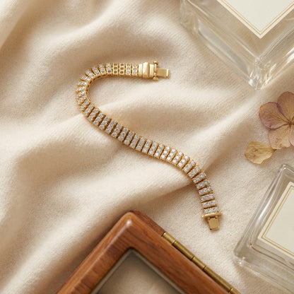 Diamond Round 4-Prong Triple Row Bracelet in 14k Yellow Gold (6.72ctw) — textile flat lay