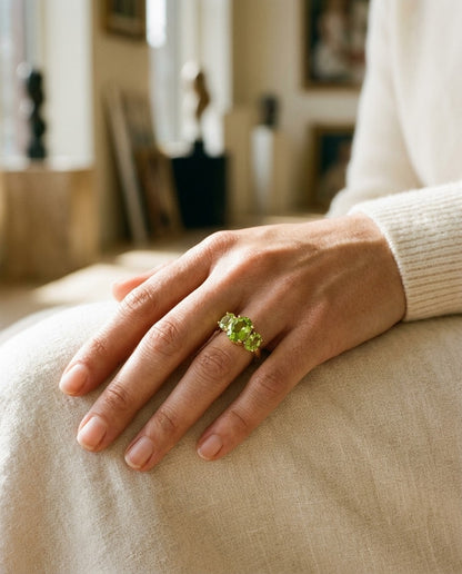 Peridot Oval Three Stone Ring In 14k Yellow Gold — portrait close