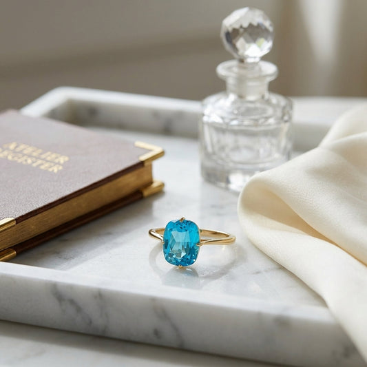 Swiss Blue Topaz Oval Ring In 14k Yellow Gold — atelier still life
