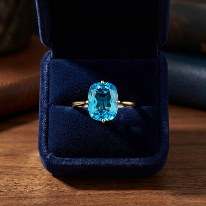 Swiss Blue Topaz Oval Ring In 14k Yellow Gold — gift presentation