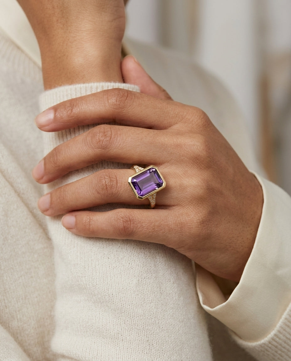Amethyst East-West Emerald Cut Bezel Ring 14k Yellow Gold 1/10ctw — editorial close-up