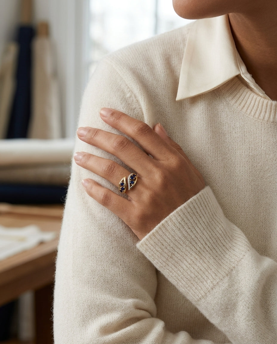 Sapphire and Diamond Open Shank Bypass Leaf Ring in 14k Yellow Gold 0.06ctw — editorial close-up
