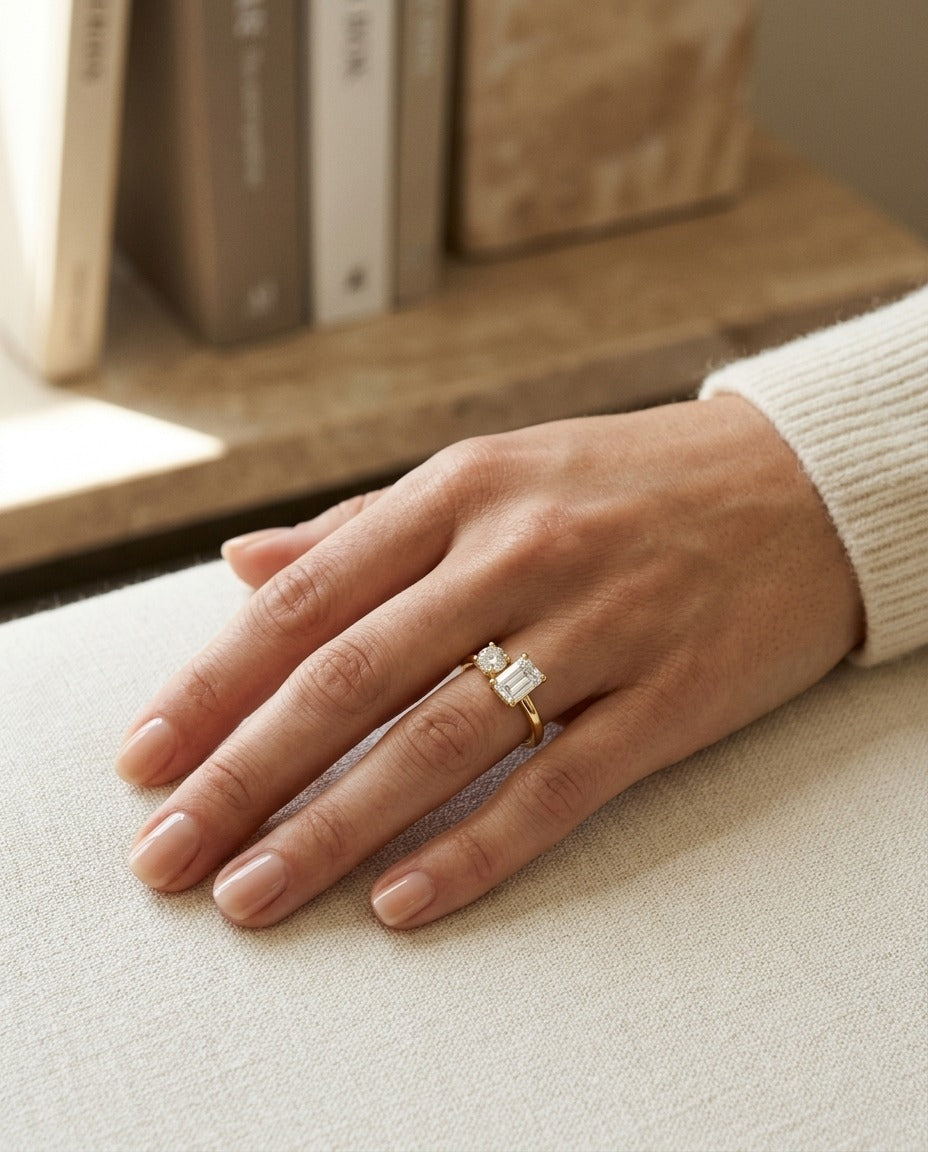 14k Yellow Gold Round and Emerald Cut Diamond Ring — portrait close