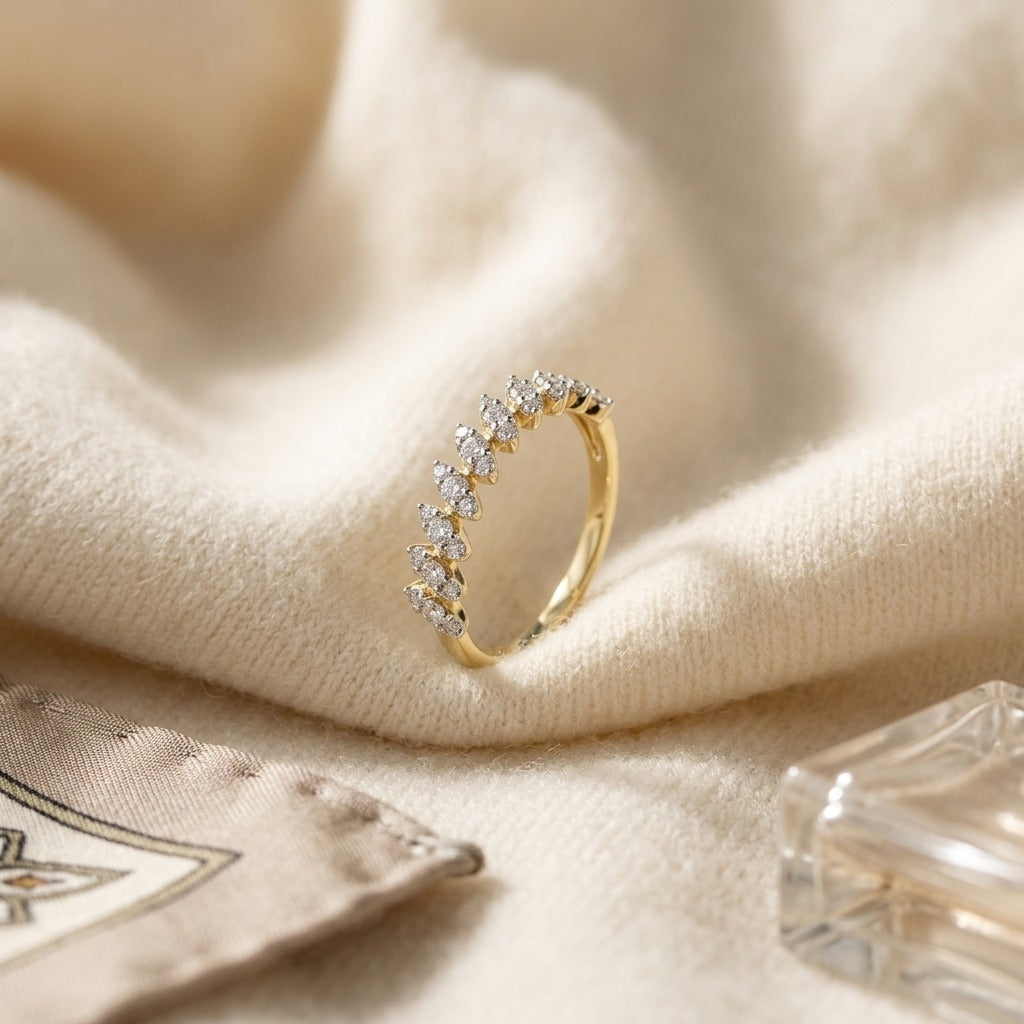 Diamond Tilted Leaf Band Ring in 14k Yellow Gold 1/3ctw — textile flat lay