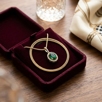 Emerald And Diamond Oval Halo Pendant With Pave Bail In 14k Yellow Gold (9x7mm) — velvet box