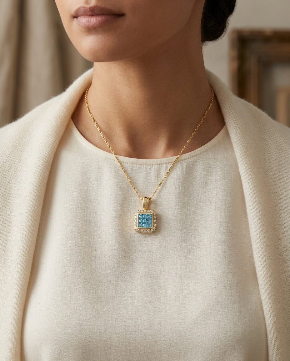Blue Topaz And Diamond Invisible Set Cube Pendant In 14k Yellow Gold (17-in Rolo Chain) — editorial close-up