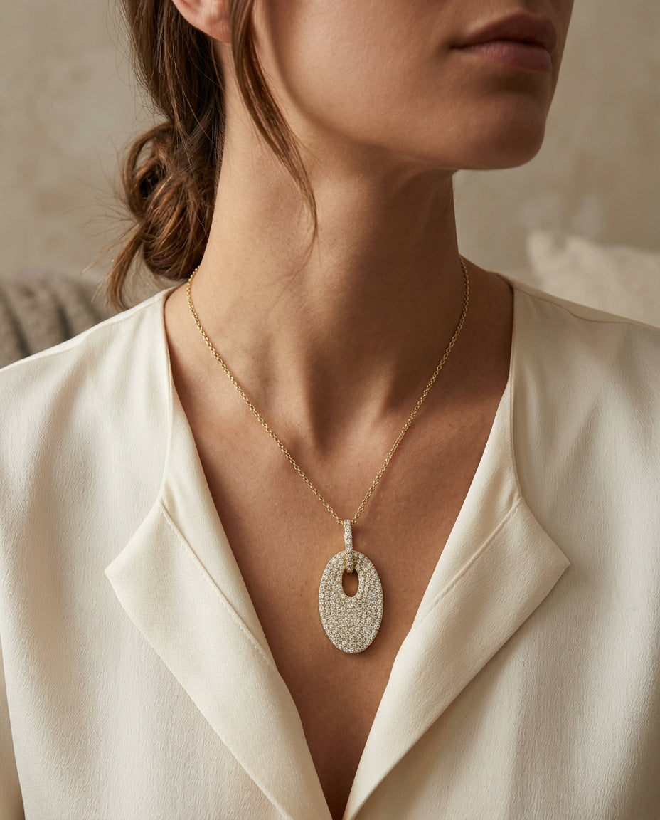 Diamond Pave Oval Disc Pendant In 14k Yellow Gold — editorial close-up