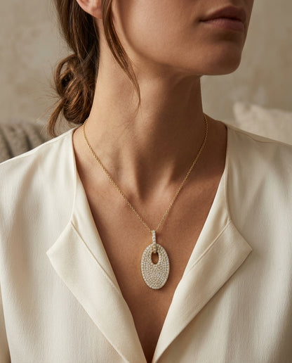 Diamond Pave Oval Disc Pendant In 14k Yellow Gold — editorial close-up