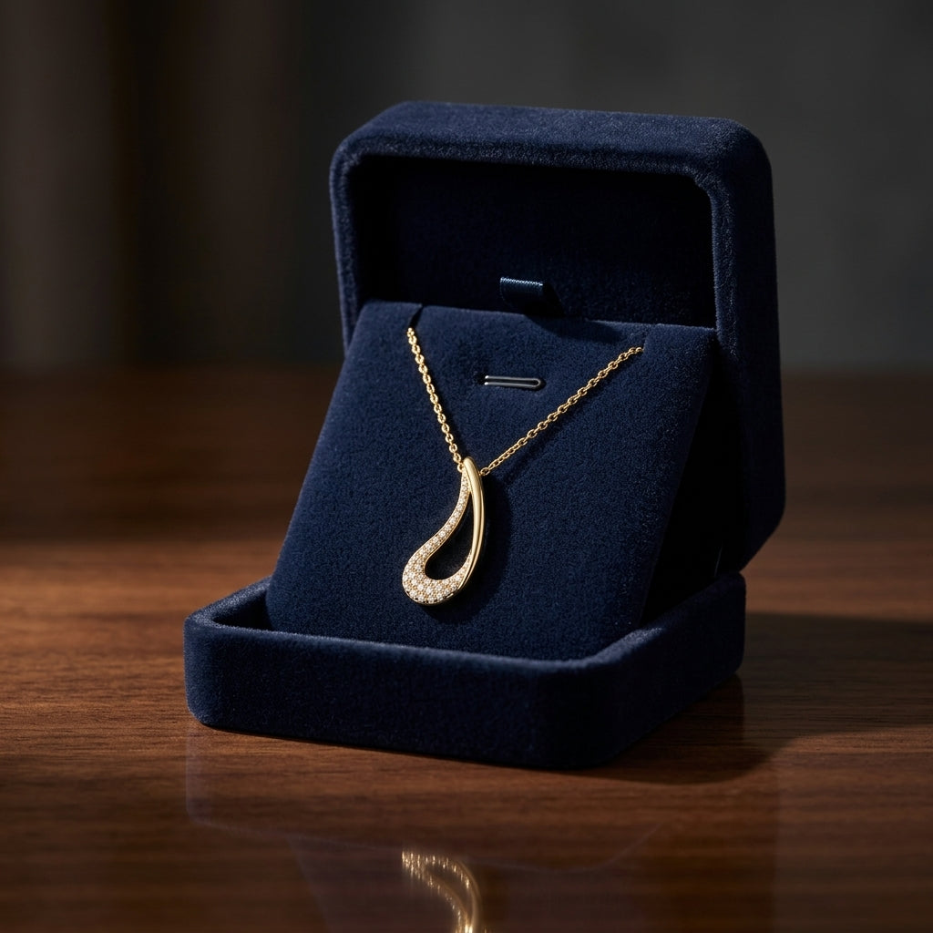 Diamond Curved Tear Drop Pendant In 14k Yellow Gold — gift presentation