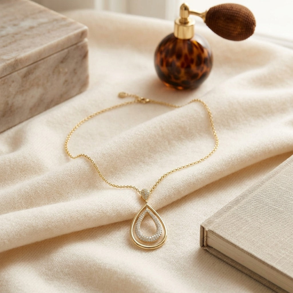 Diamond Double Oval Pendant In 14k Yellow Gold 18 Inch Length — textile flat lay