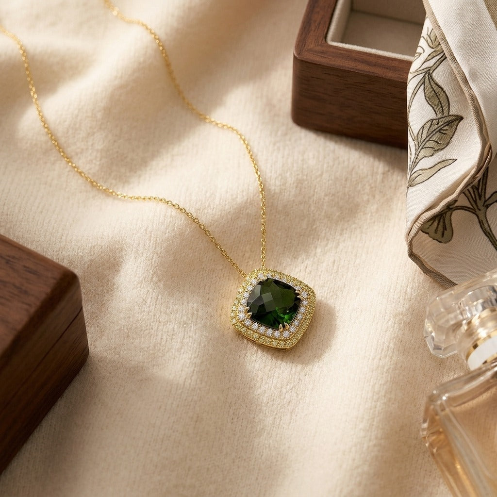 Green Tourmaline Cushion Pendant with Peridot and Diamond Borders in 14k Yellow Gold (11mm) — textile flat lay