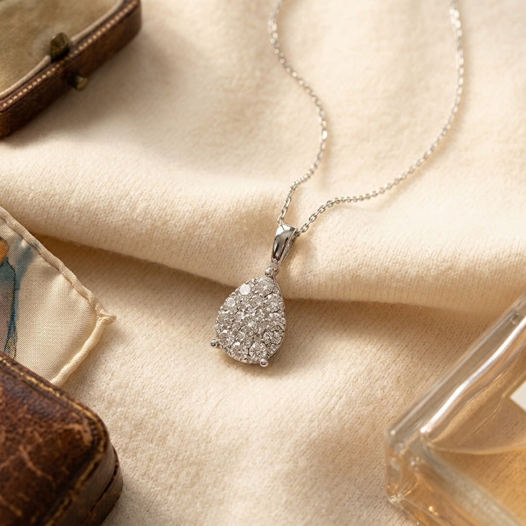Diamond Pear Shape Cluster Solitaire Pendant in 14k Yellow Gold 3/8ctw with Adjustable Chain 16-17-18 Inch — textile flat lay