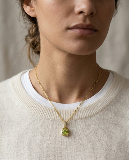 Peridot Round Bezel & Diamond 0.02ctw Pendant Set 16-18 Adj Chain in 14K Yellow Gold - editorial hero