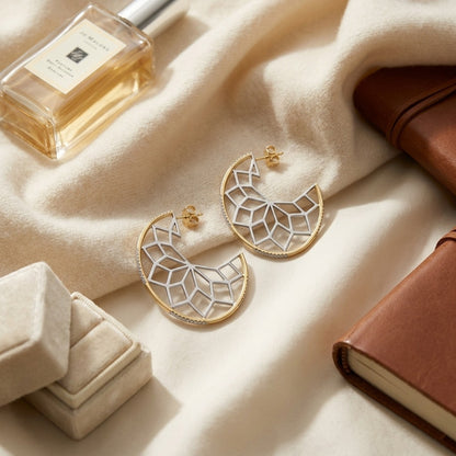 Diamond Snowflake Earrings in 14k Yellow Gold 1/3ctw — textile flat lay