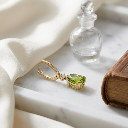 14k Yellow Gold Pear Shape Peridot With Diamond Accent — atelier still life