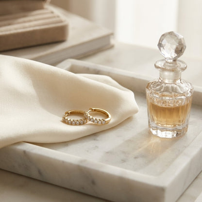 Diamond Oval Hoop Huggie Earrings in 14k Yellow Gold 1/4ctw — marble silk
