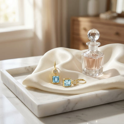 Swiss Blue Topaz Bezel Earrings in 14k Yellow Gold 0.08ctw — marble silk