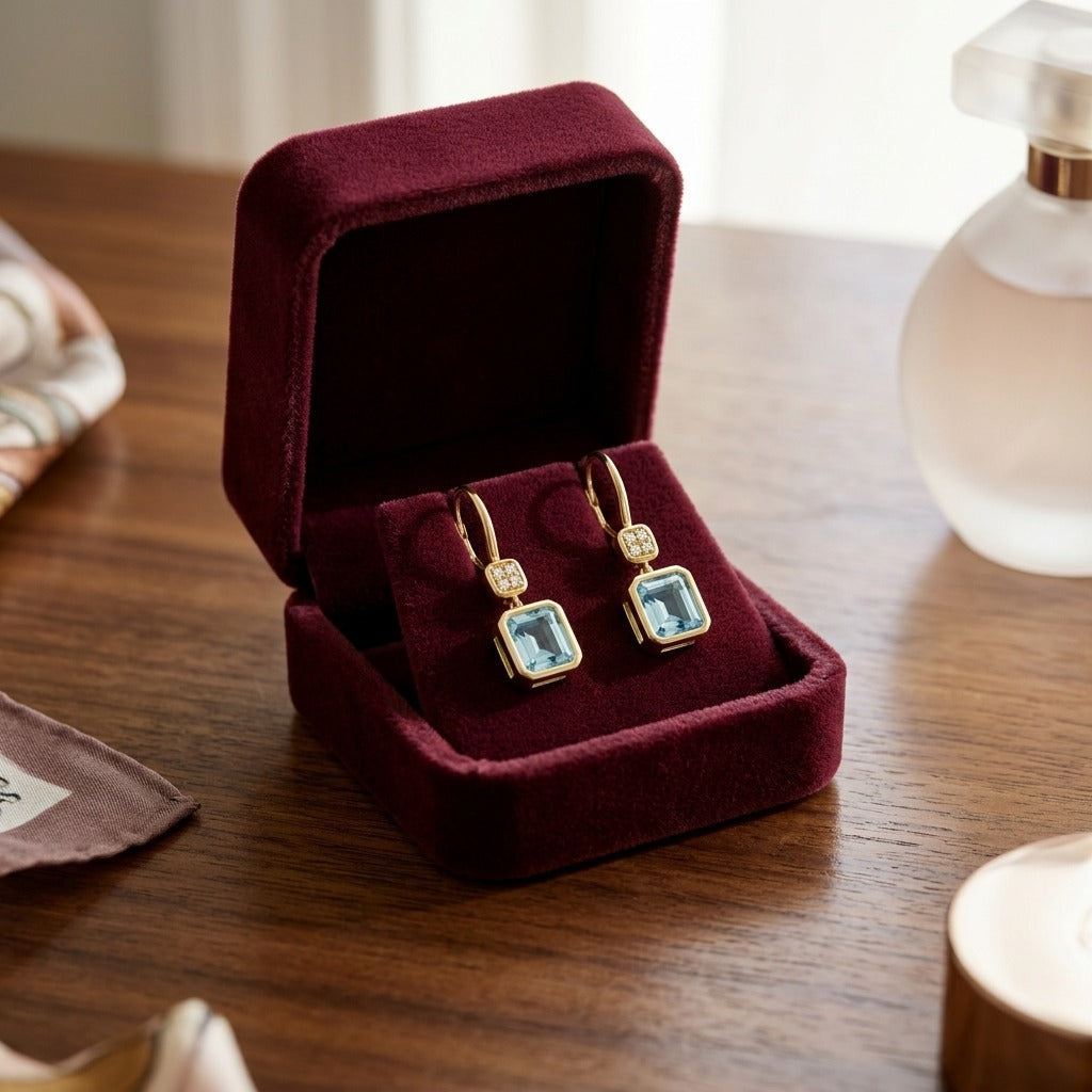 Swiss Blue Topaz Bezel Earrings in 14k Yellow Gold 0.08ctw — velvet box