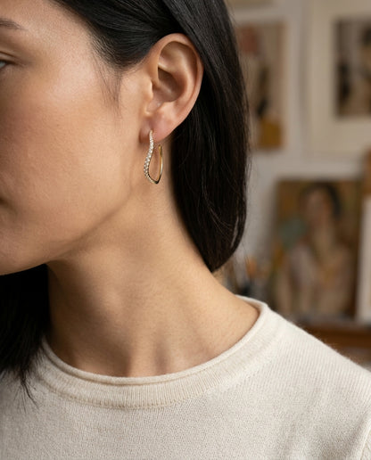 Diamond Wave Hoop Earrings in 14k Yellow Gold 1/2ctw — editorial close-up