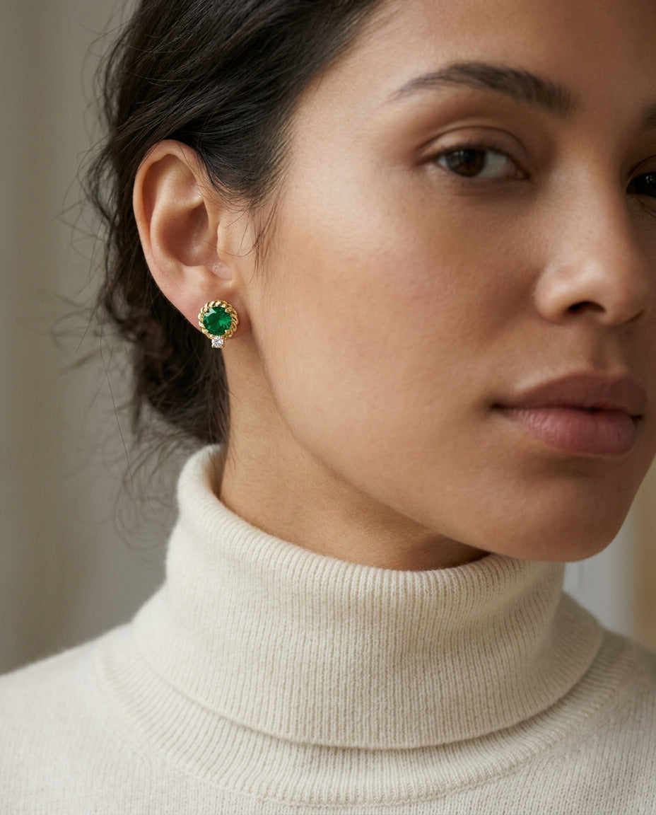 Lab Created Emerald and Diamond Ripple Edge Halo Stud Earrings in 14k Yellow Gold 1/5ctw — editorial close-up