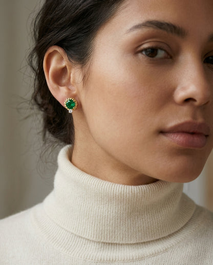 Lab Created Emerald and Diamond Ripple Edge Halo Stud Earrings in 14k Yellow Gold 1/5ctw — editorial close-up