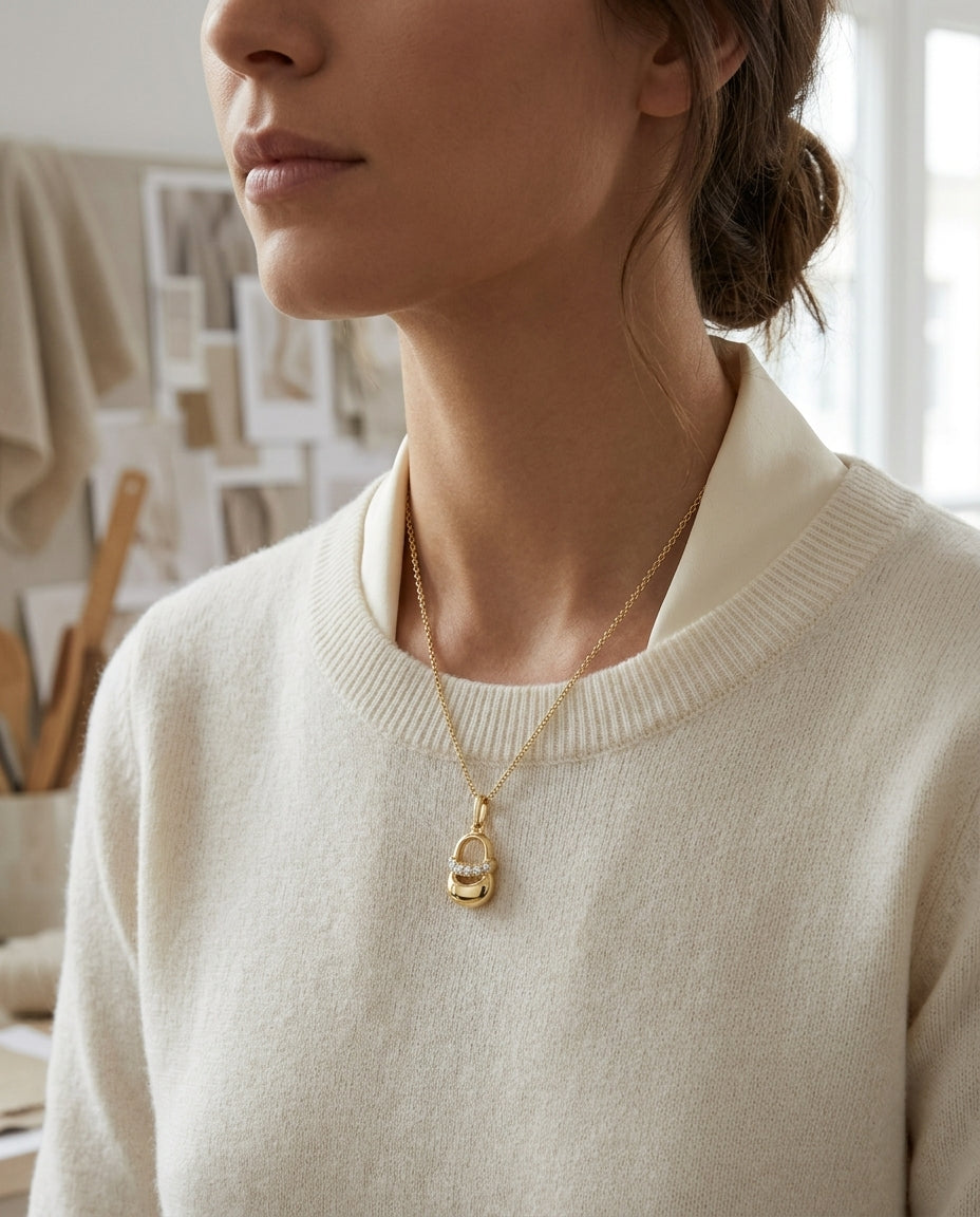 Diamond Baby Shoe Necklace In 14k Yellow Gold Adjustable Chain 14-16 Inch — editorial close-up