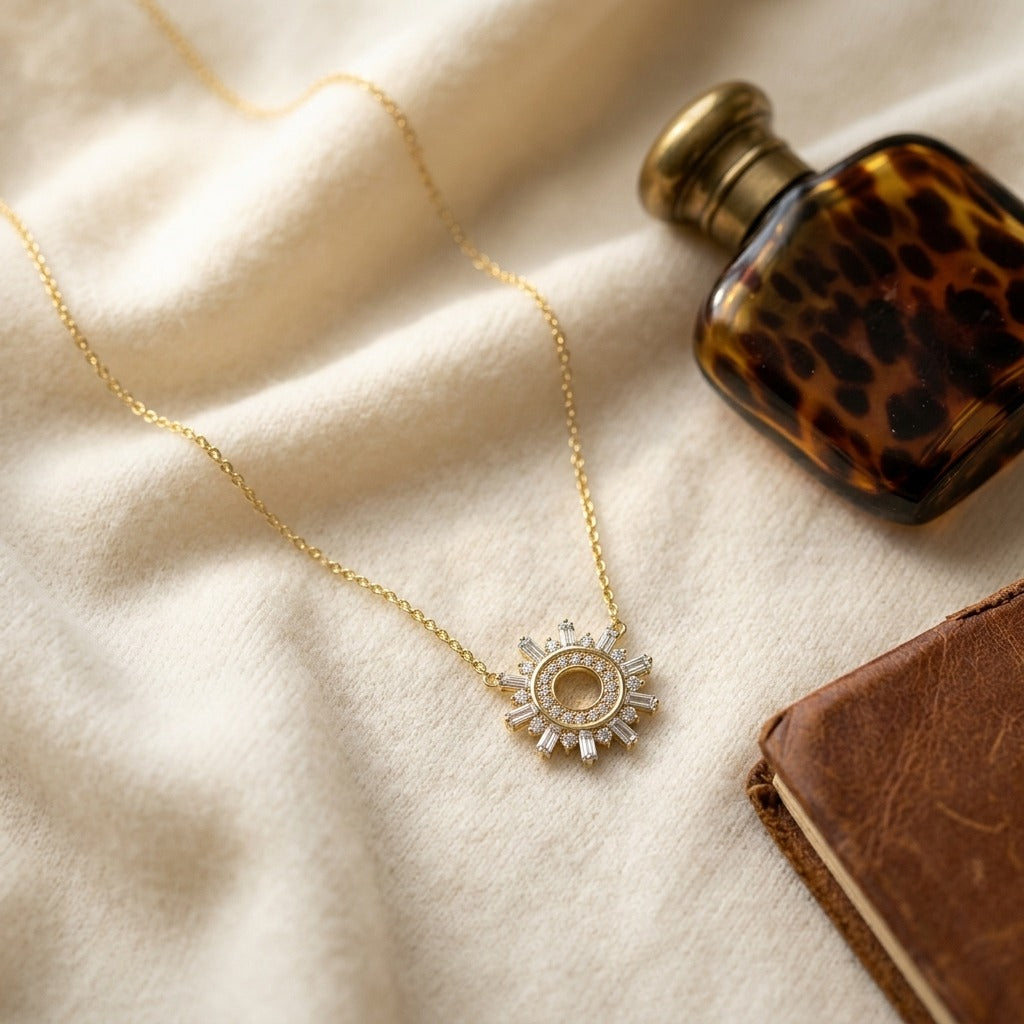 Diamond Round and Straight Baguette Starburst Necklace in 14k Yellow Gold — textile flat lay