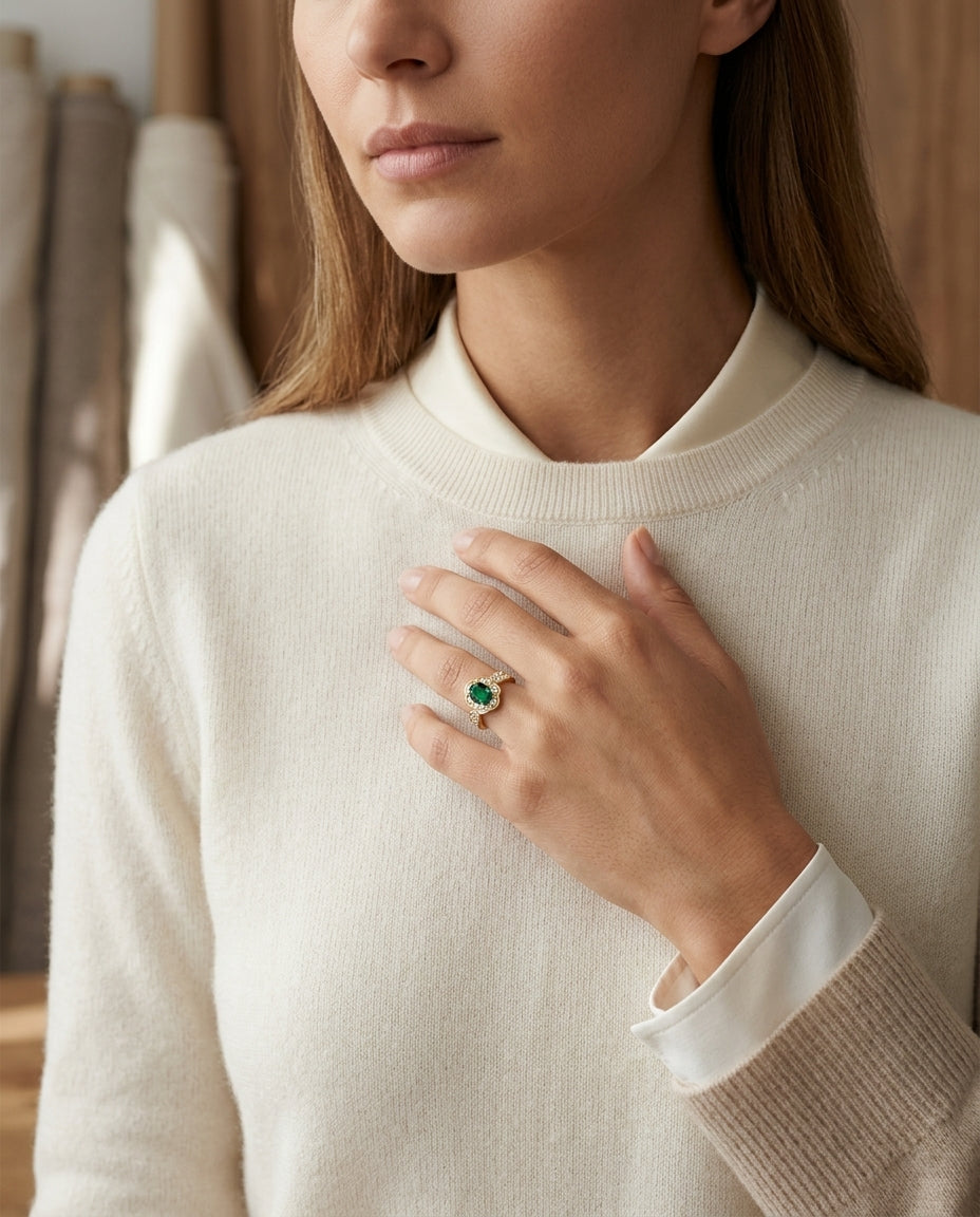 Created Emerald And Diamond Oval Floral Ring In 14k Yellow Gold — editorial close-up