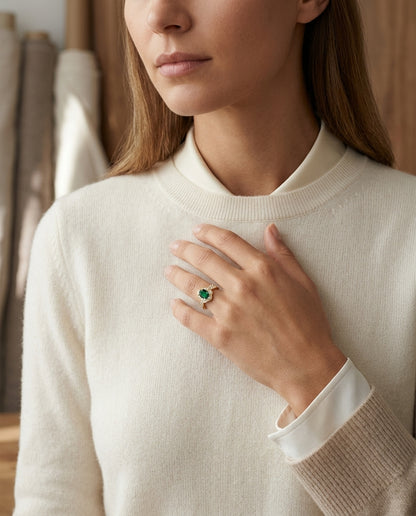 Created Emerald And Diamond Oval Floral Ring In 14k Yellow Gold — editorial close-up