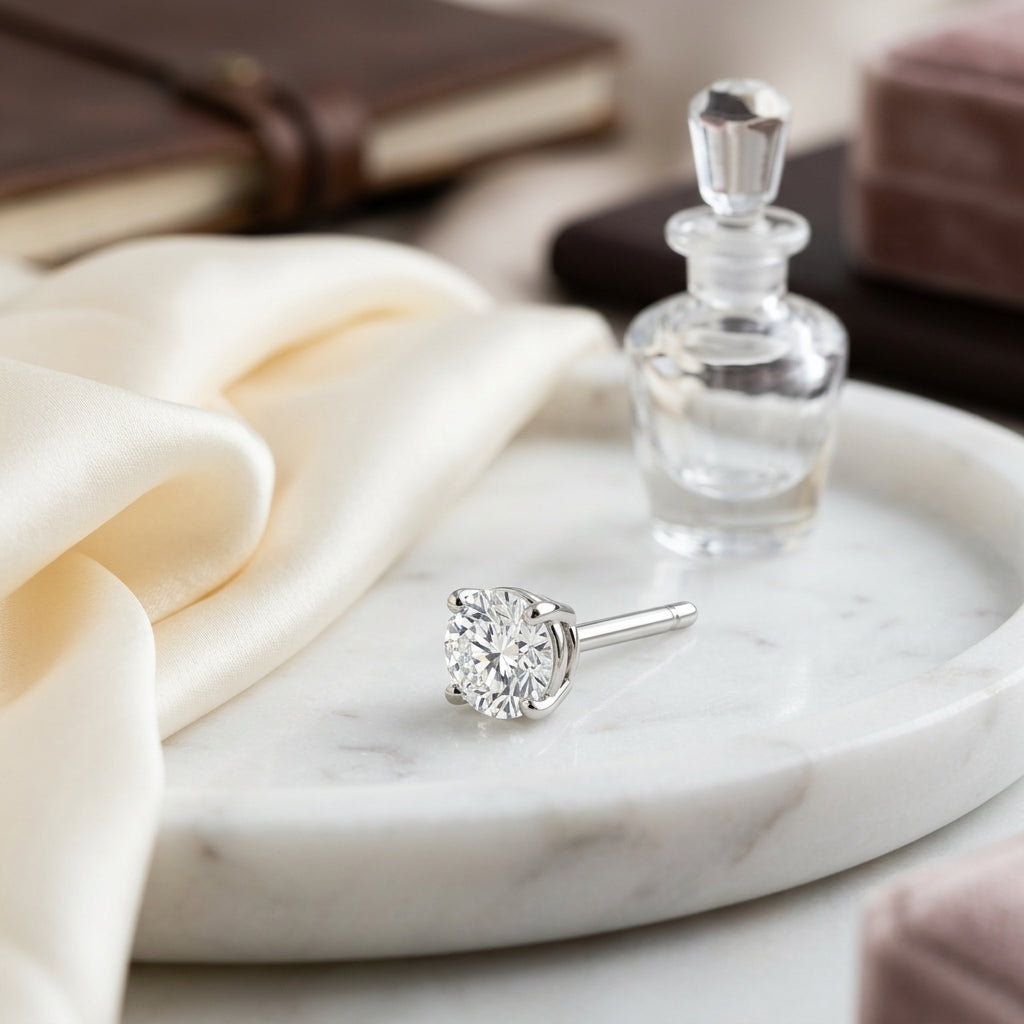 14k Yellow Gold 4-prong Round Brilliant Diamond Stud Earrings (1.47 Ct. T.w., Si1-si2 Clarity, H-i Color) — atelier still life