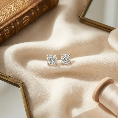 14k Yellow Gold 8-Prong Round Brilliant Diamond Stud Earrings (1.06 Ct. T.w., Vs1-Vs2 Clarity, H-I Color) — textile flat lay