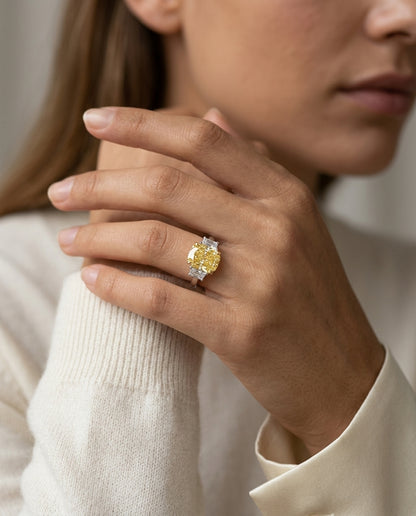 Prong Set Gia Certified Fancy Yellow Diamond Engagement Ring In Platinum — editorial close-up