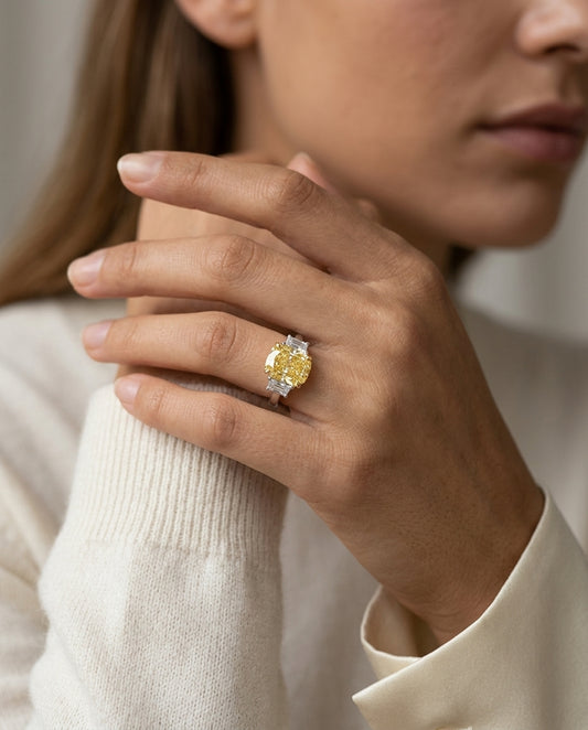Prong Set Gia Certified Fancy Yellow Diamond Engagement Ring In Platinum — editorial close-up