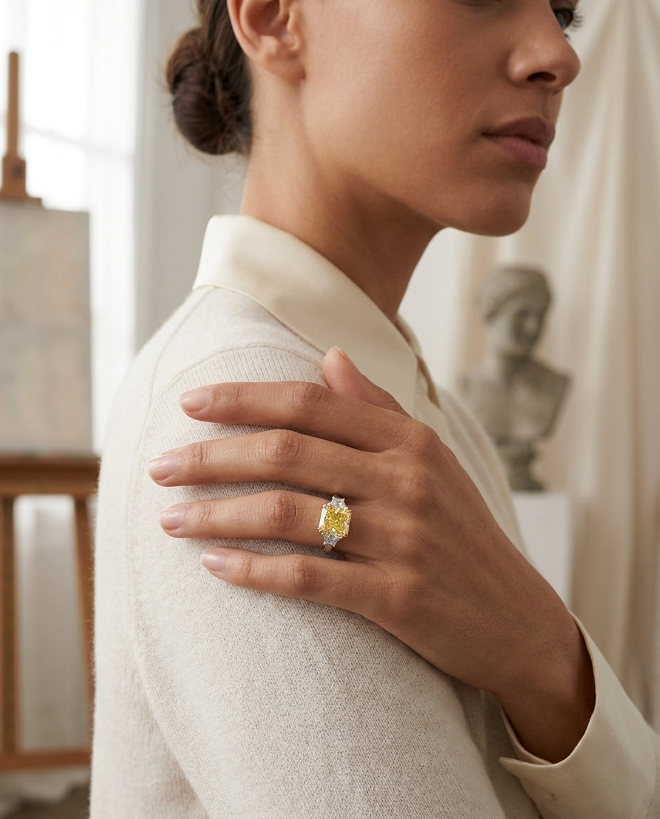 Prong Set Gia Certified Fancy Intense Yellow Diamond Engagement Ring In Platinum — editorial close-up