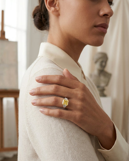 Prong Set Gia Certified Fancy Intense Yellow Diamond Engagement Ring In Platinum — editorial close-up
