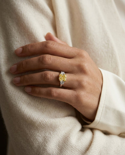 Prong Set Gia Certified Fancy Yellow Diamond Engagement Ring In Platinum — editorial close-up