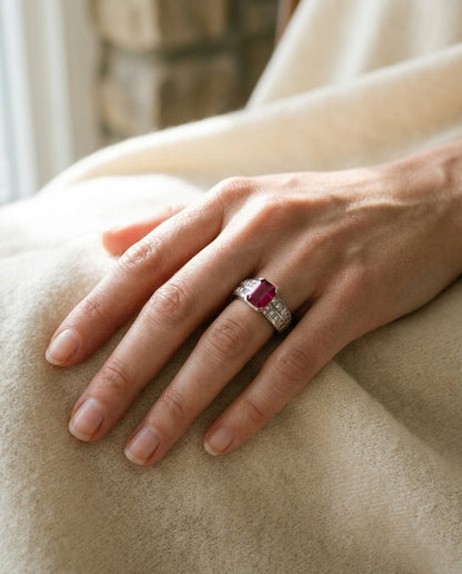 Emerald-Cut Ruby Center and Princess Cut Channel Set Diamond Shank in Platinum — portrait close