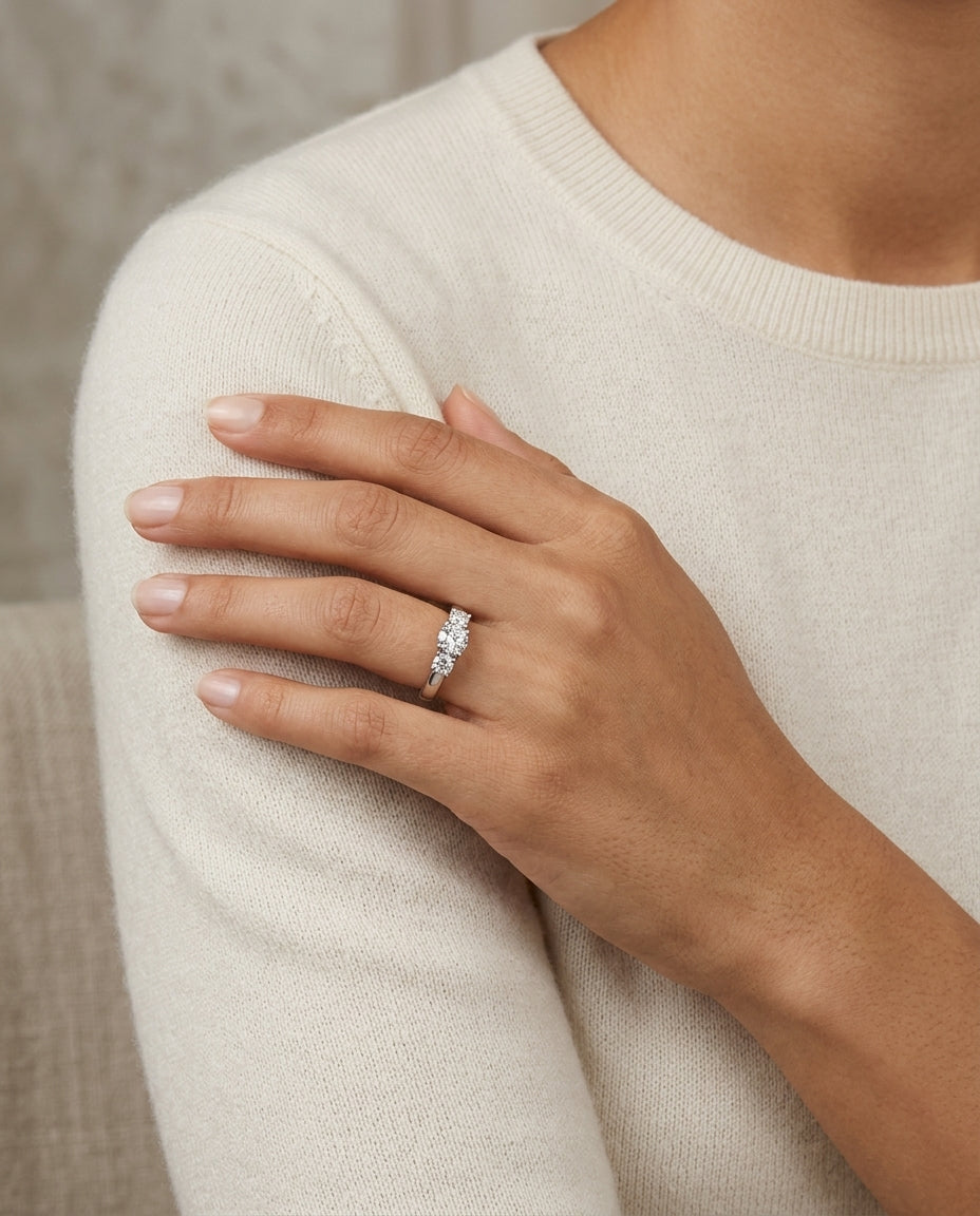 3 Round Brilliant Diamonds In Platinum  Engagement Ring — editorial close-up