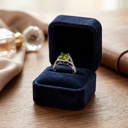 Peridot And Diamond Infinity Twist Ring In Platinum — velvet box