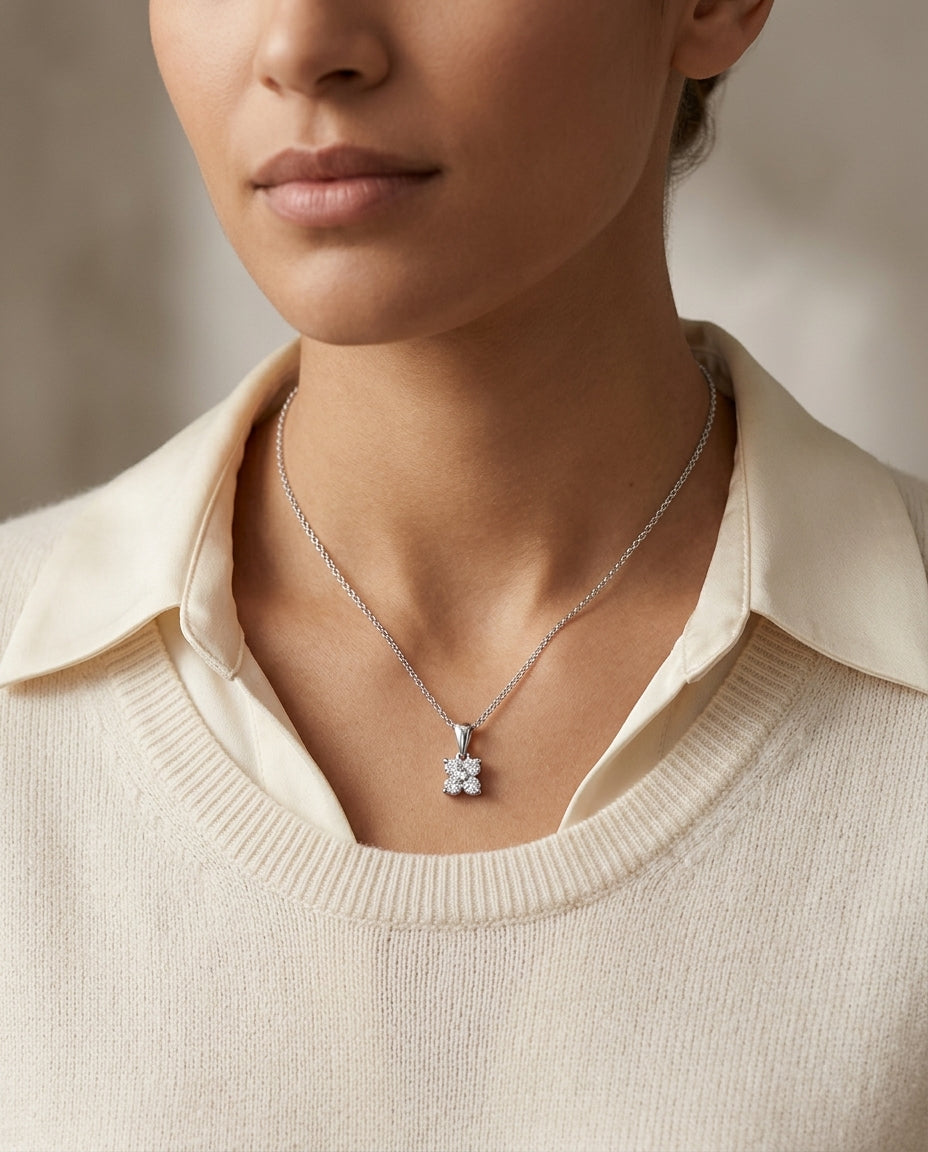 Diamond 4-petal Floral Petite Pendant In Platinum (18kw Cable Chain) — editorial close-up
