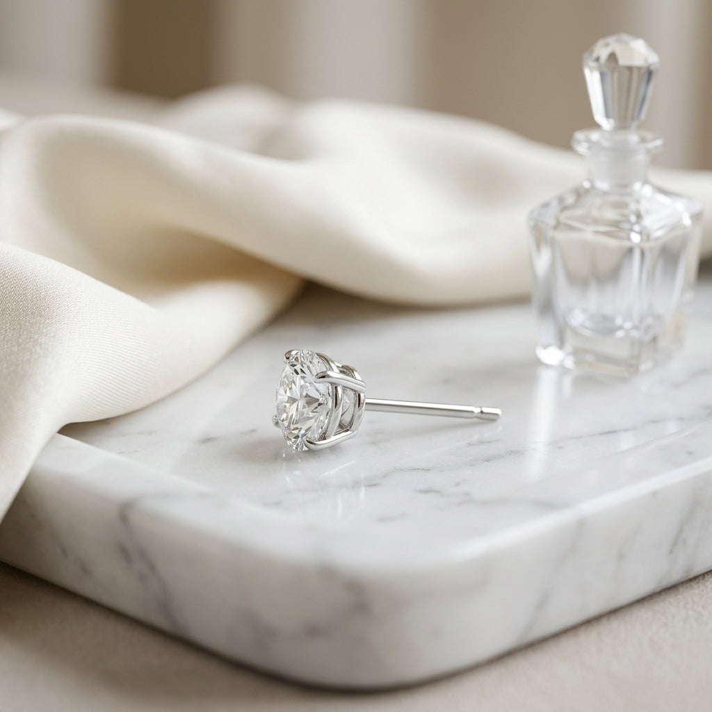 Platinum 3-prong Round Brilliant Diamond Stud Earrings (1.06 Ct. T.w., Vs1-vs2 Clarity, F-g Color) — atelier still life