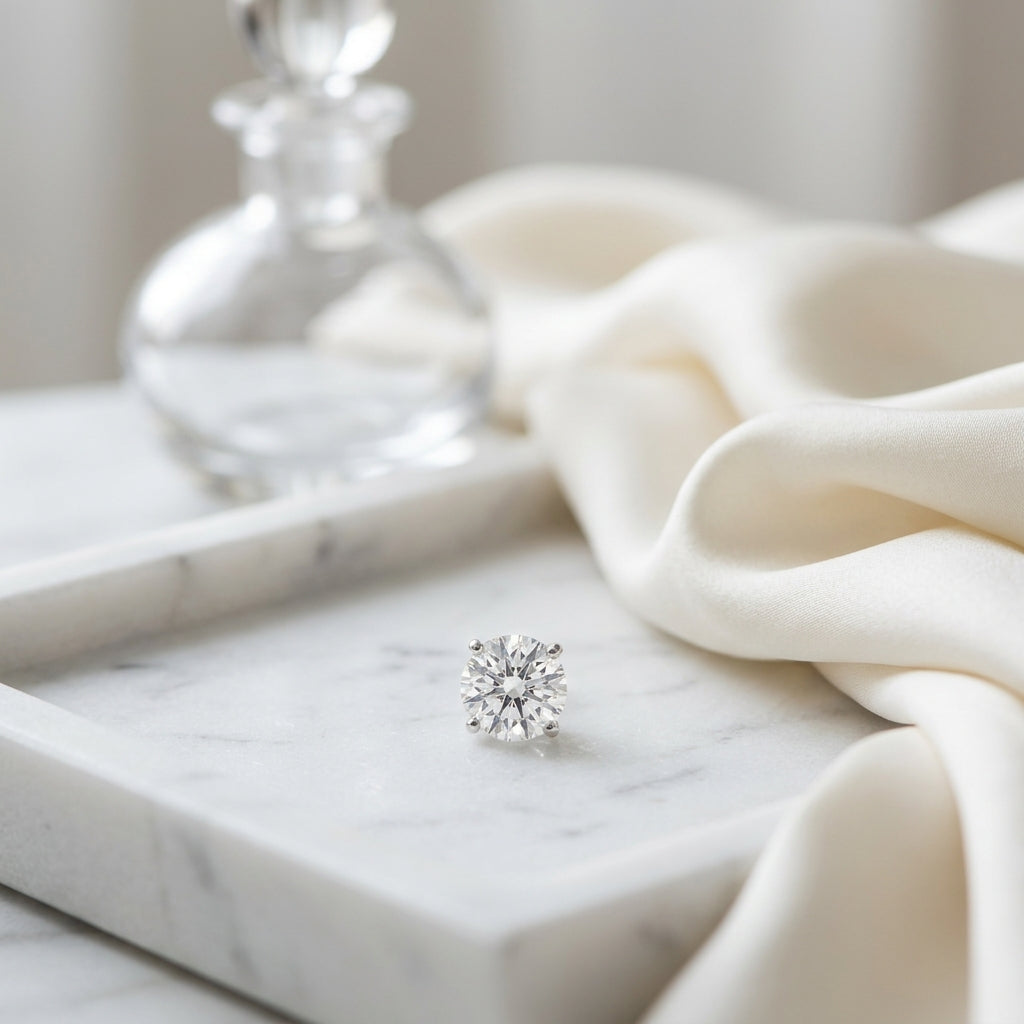 Platinum 4-prong Round Brilliant Diamond Stud Earrings (0.75 Ct. T.w., Si1-si2 Clarity, H-i Color) — atelier still life