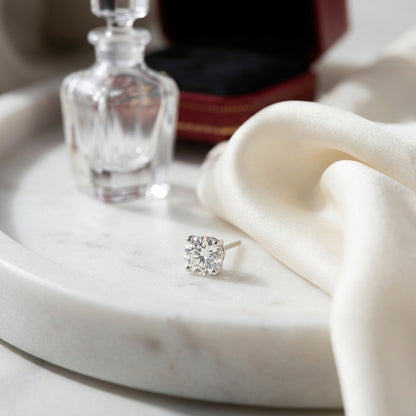 Platinum 4-prong Round Brilliant Diamond Stud Earrings (0.75 Ct. T.w., Vs1-vs2 Clarity, H-i Color) — atelier still life