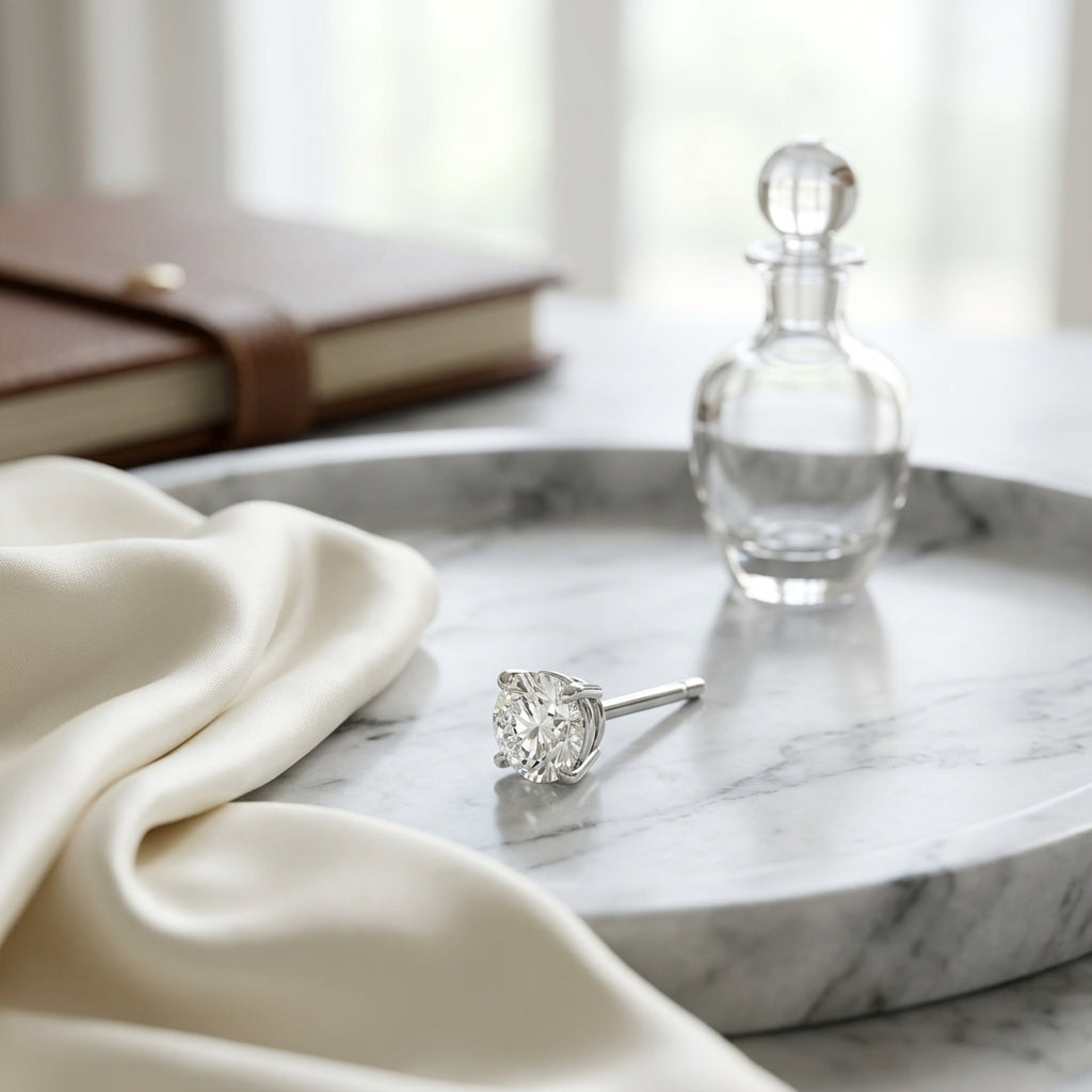 Platinum 4-prong Round Brilliant Diamond Stud Earrings (1.06 Ct. T.w., Vs1-vs2 Clarity, H-i Color) — atelier still life