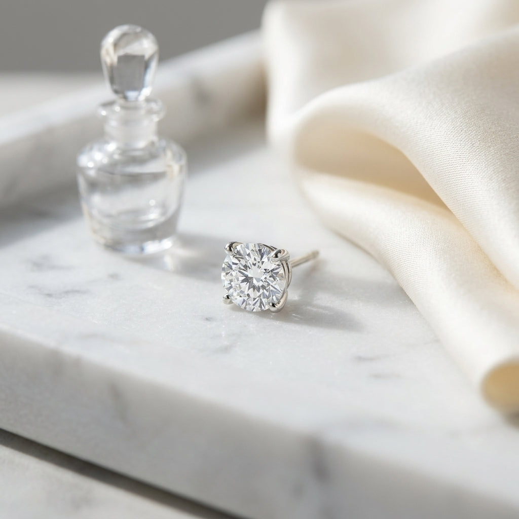 Platinum 4-prong Round Brilliant Diamond Stud Earrings (1.48 Ct. T.w., Vs1-vs2 Clarity, H-i Color) — atelier still life