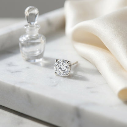 Platinum 4-prong Round Brilliant Diamond Stud Earrings (1.48 Ct. T.w., Vs1-vs2 Clarity, H-i Color) — atelier still life