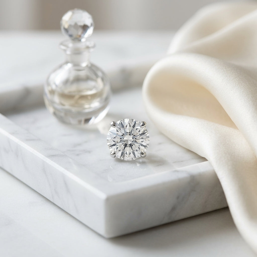 Platinum 4-prong Round Brilliant Diamond Stud Earrings (2.09 Ct. T.w., Si1-si2 Clarity, H-i Color) — atelier still life