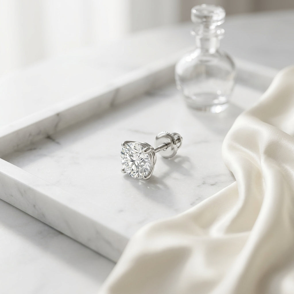 Platinum 4-prong Round Brilliant Diamond Stud Earrings (2.09 Ct. T.w., Vs1-vs2 Clarity, H-i Color) — atelier still life