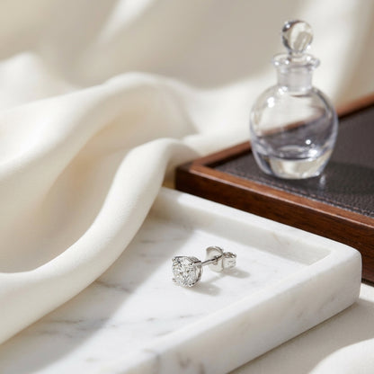 Platinum Bezel Set Round Brilliant Diamond Stud Earrings (0.75 Ct. T.w., Vs1-vs2 Clarity, F-g Color) — atelier still life